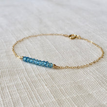 Load image into Gallery viewer, Sky blue topaz bracelet in 14k gold