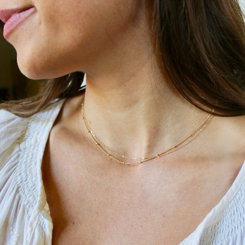 delicate multi chain necklace