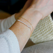 Load image into Gallery viewer, Dainty pearl bar bracelet in solid 14k gold
