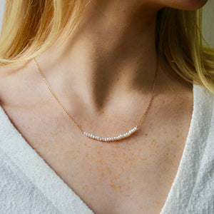 Simple pearl bar necklace in 14k gold