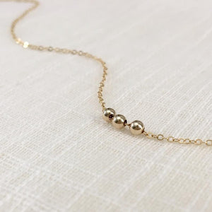 Dainty 14k gold custom friendship bead necklace