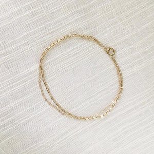 dainty layered chain bracelet in gold